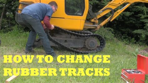 how to change tracks on jcb mini digger|jcb digger tracks removed.